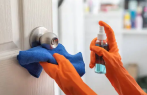 Regularly clean door handles, locks, hinges, and other hardware picture
